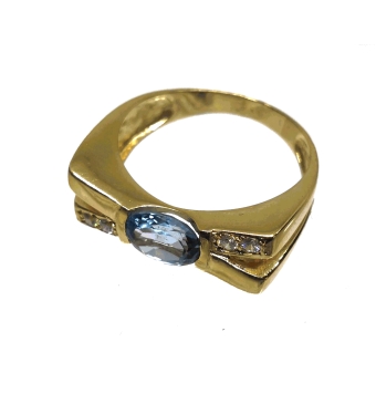 ANILLO MUJER ORO AMARILLO 18 KILATES CRUZADO CIRCONITAS BLANCAS Y AGUAMARINA EN EL CENTRO ANCHO 7X22 MILÍMETROS